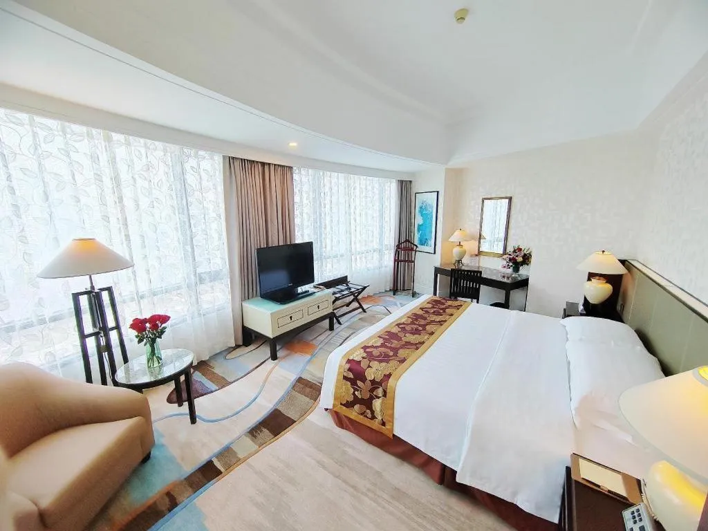 Bed in Hainan Junhua Haiyi Hotel