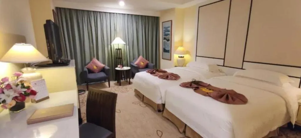 Bed in Hainan Junhua Haiyi Hotel