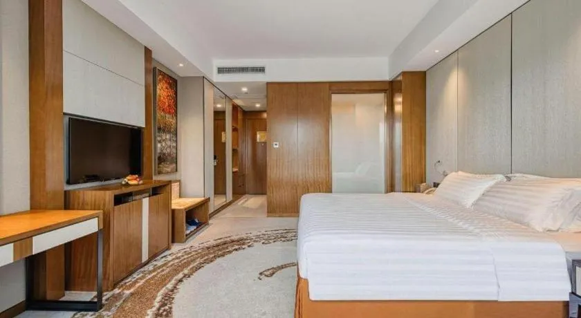 Bed in Hainan Junhua Haiyi Hotel