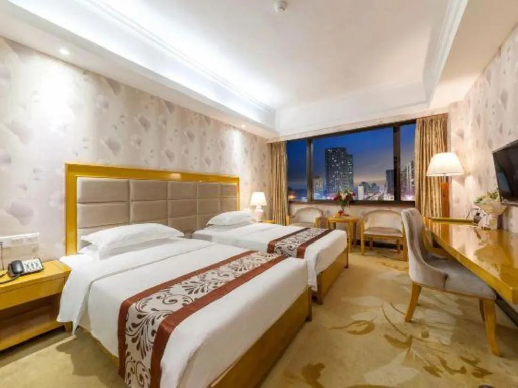 Bed in Xiamen Plaza Hotel