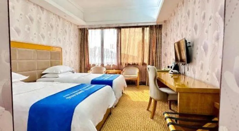 Bed in Xiamen Plaza Hotel