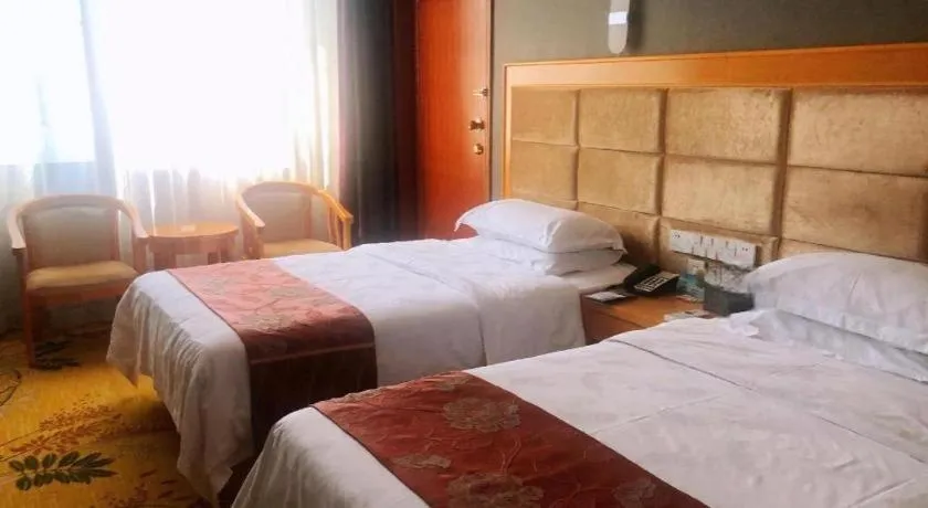 Bed in Xiamen Plaza Hotel