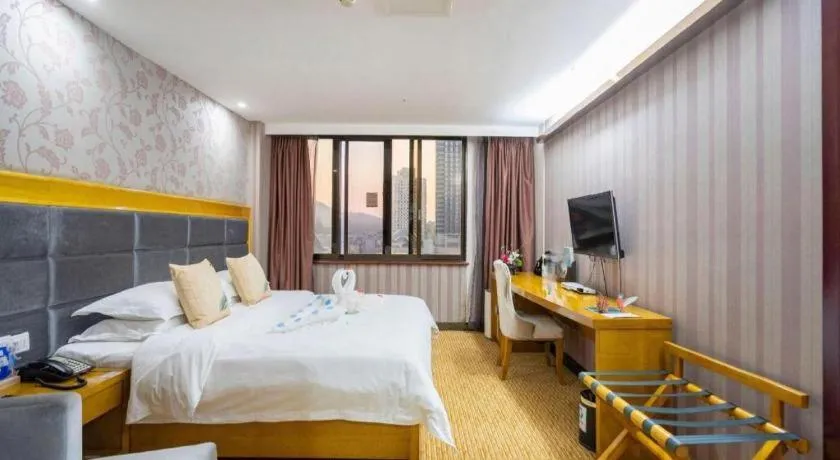 Bed in Xiamen Plaza Hotel