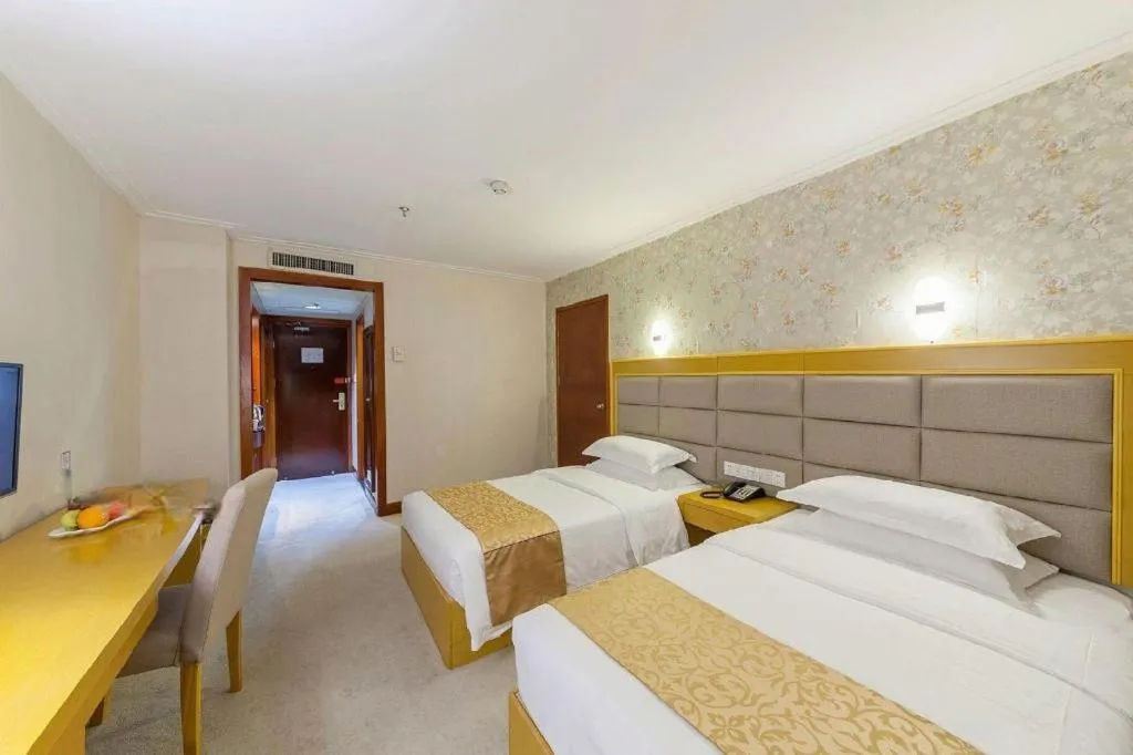 Bed in Xiamen Plaza Hotel