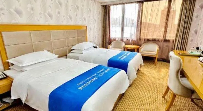 Bed in Xiamen Plaza Hotel