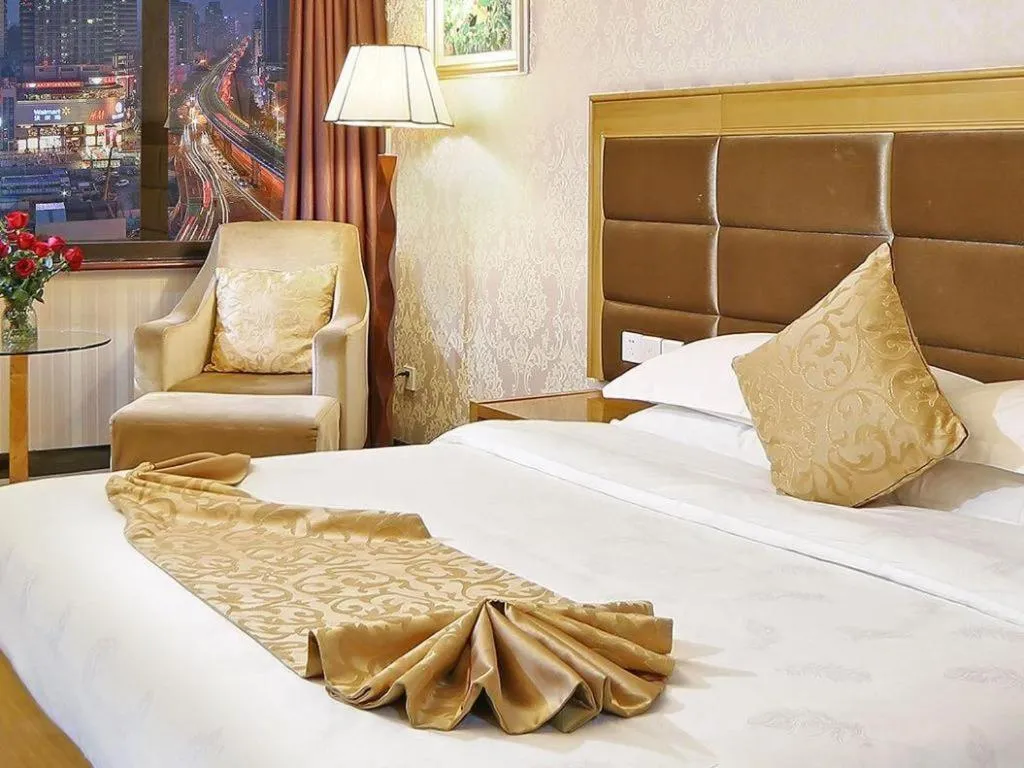 Bed in Xiamen Plaza Hotel