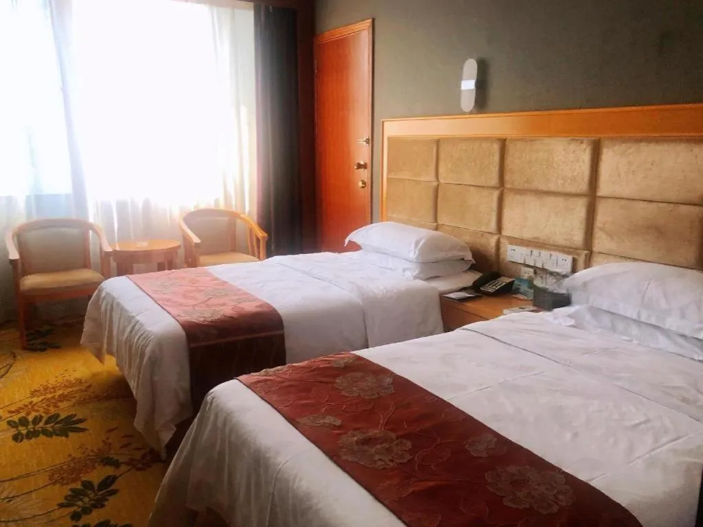 Bed in Xiamen Plaza Hotel