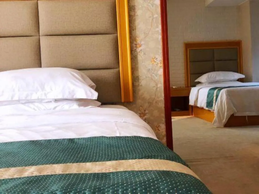 Bed in Xiamen Plaza Hotel