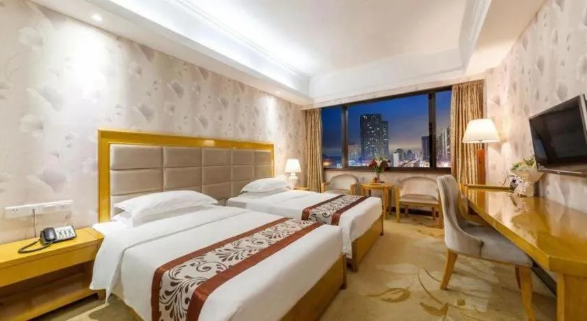 Bed in Xiamen Plaza Hotel