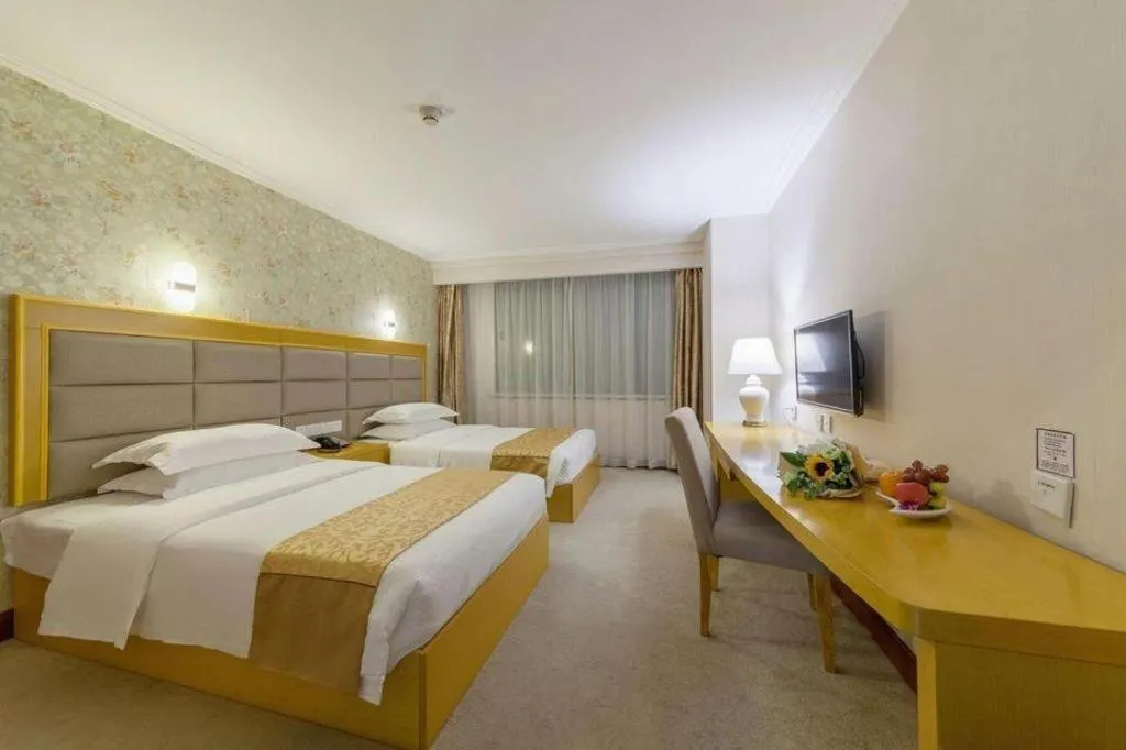 Bed in Xiamen Plaza Hotel