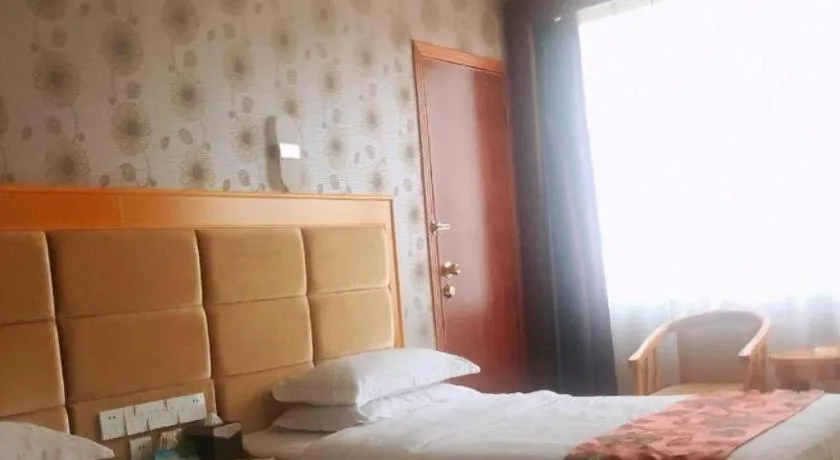 Bed in Xiamen Plaza Hotel