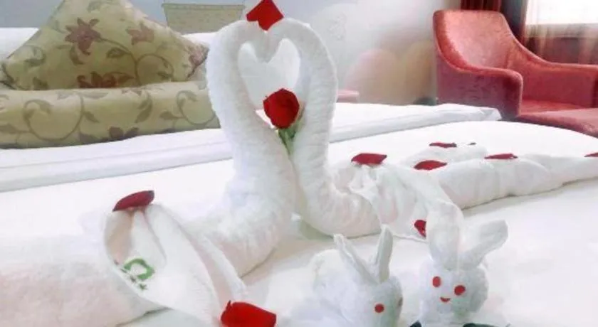 Bed in Xiamen Plaza Hotel