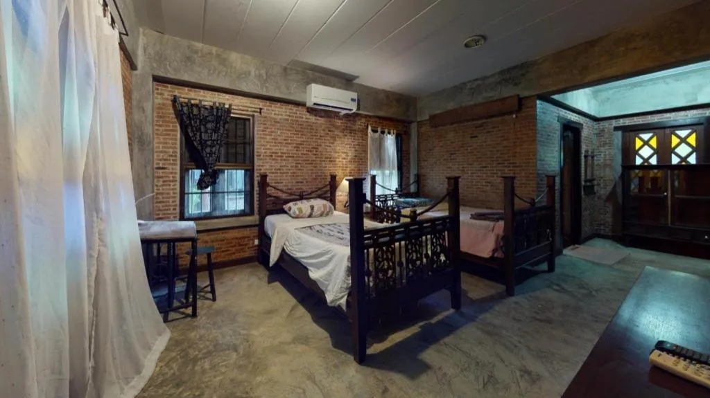 Bed in Baan Gong Kham Hotel