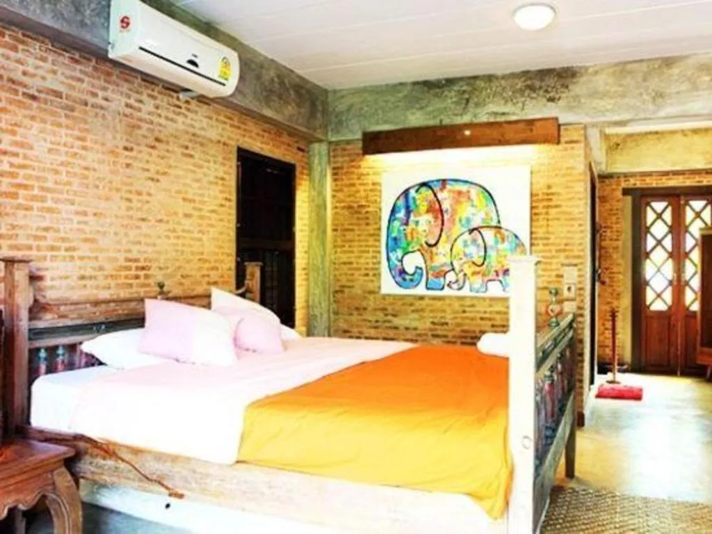 Bed in Baan Gong Kham Hotel