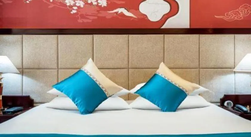 Bed in Wonderport International Hotel