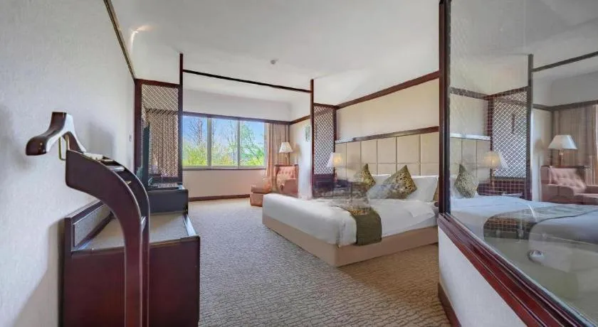 Bed in Wonderport International Hotel