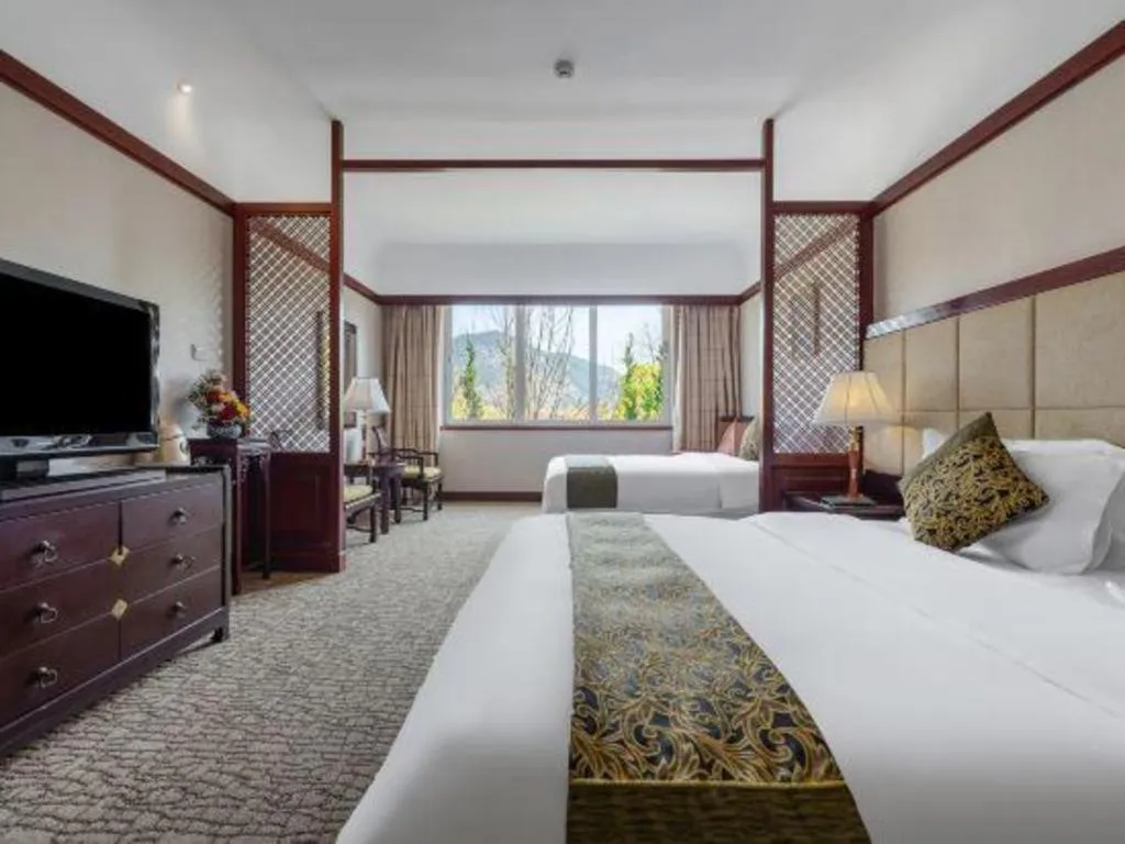 Bed in Wonderport International Hotel