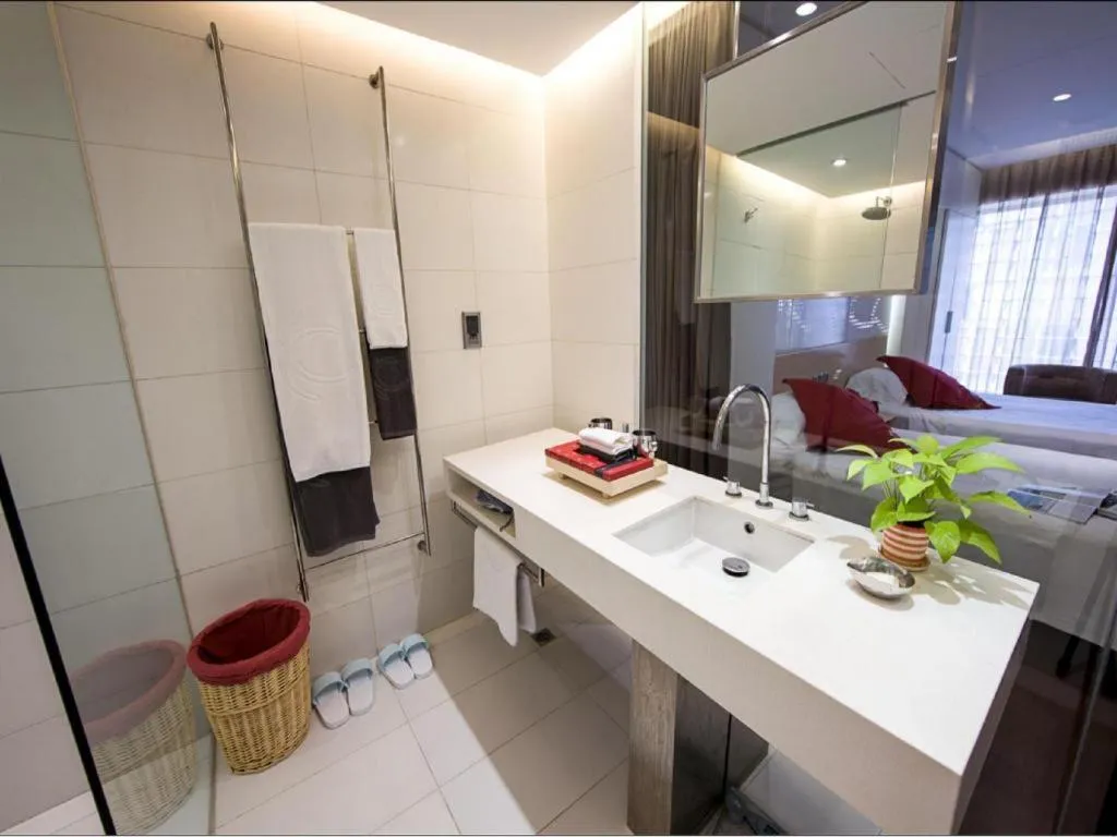 Bed in Hotel Kapok Wangfujing