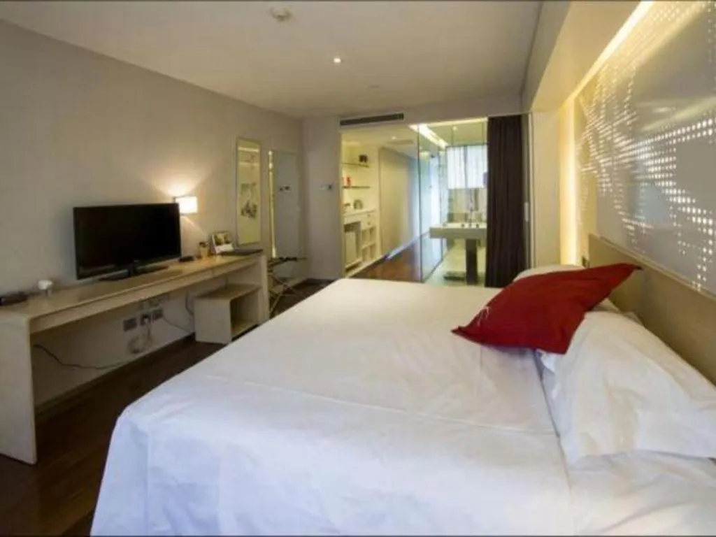 Bed in Hotel Kapok Wangfujing