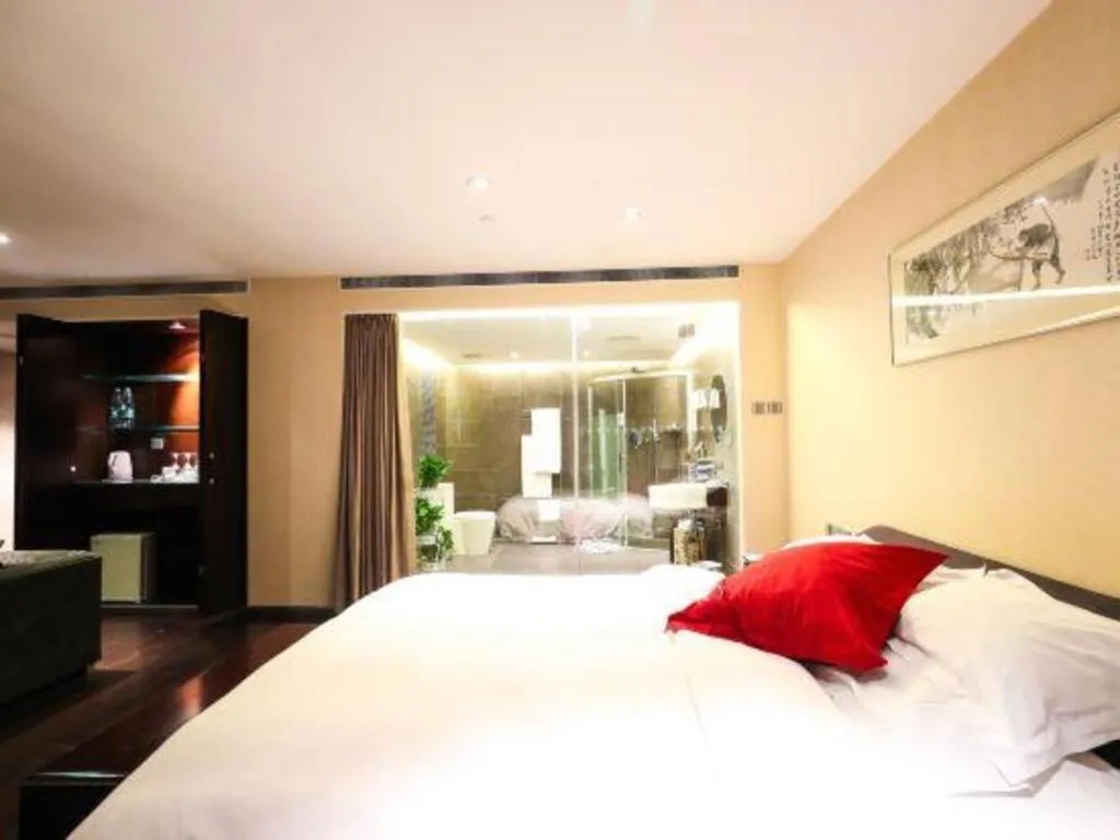 Bed in Hotel Kapok Wangfujing