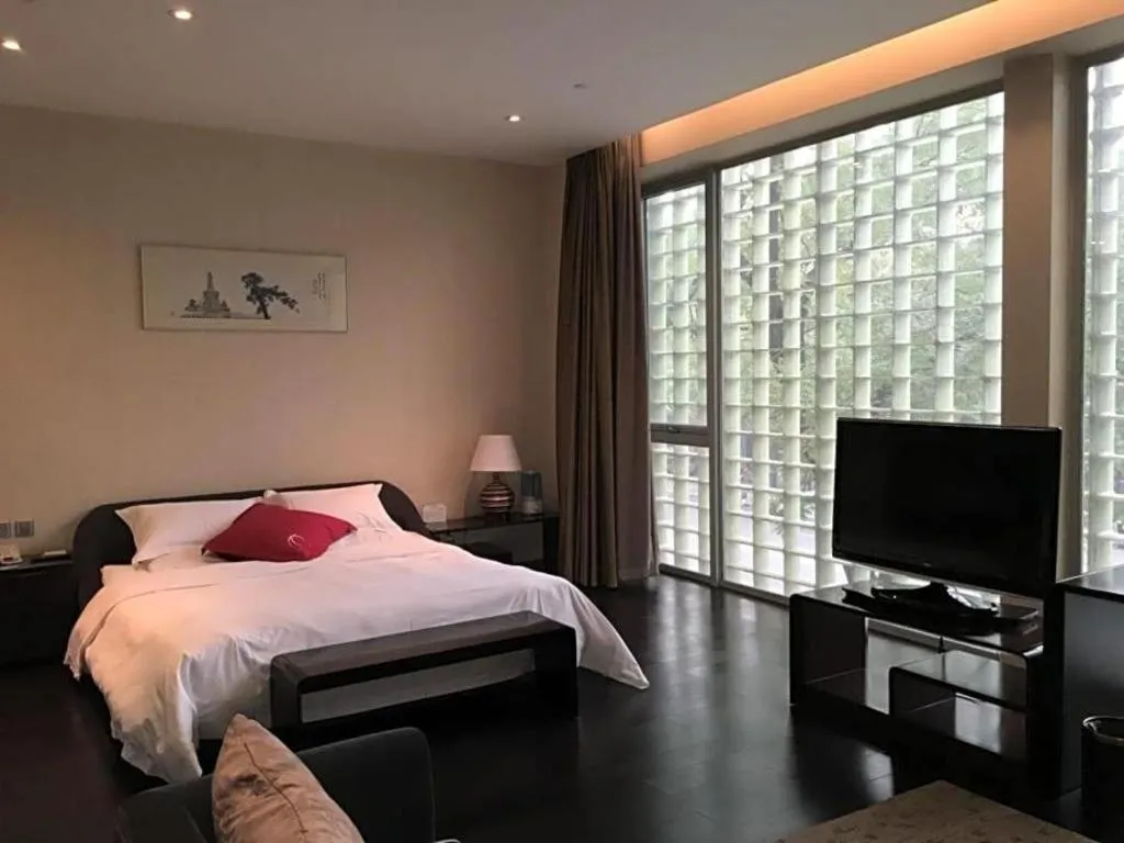 Bed in Hotel Kapok Wangfujing