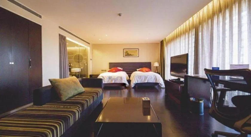 Bed in Hotel Kapok Wangfujing