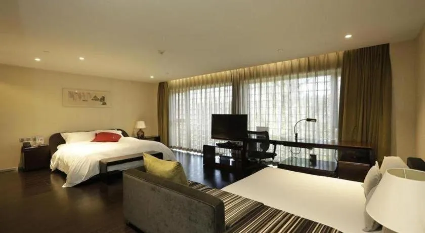 Bed in Hotel Kapok Wangfujing