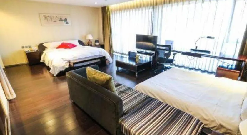 Bed in Hotel Kapok Wangfujing