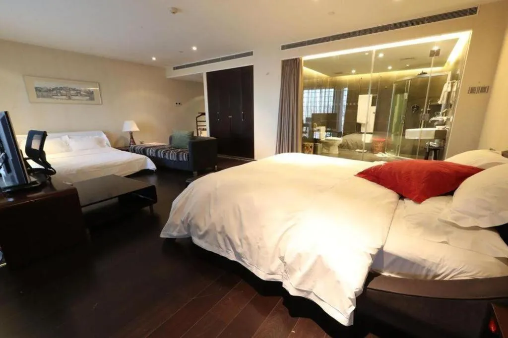 Bed in Hotel Kapok Wangfujing