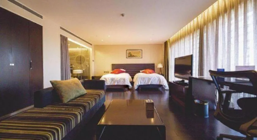 Bed in Hotel Kapok Wangfujing