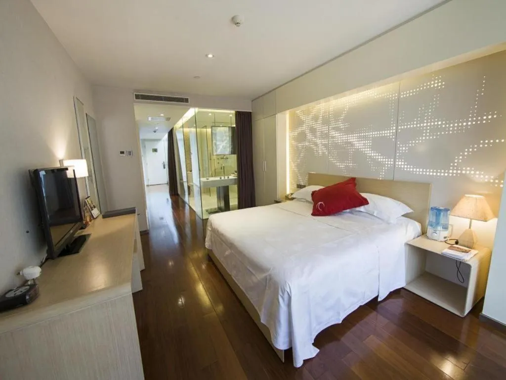 Bed in Hotel Kapok Wangfujing