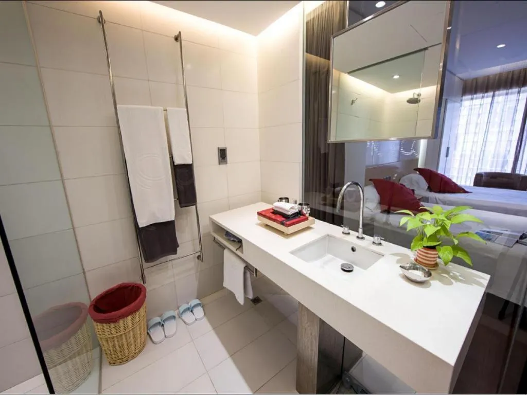 Bed in Hotel Kapok Wangfujing