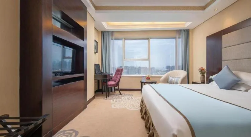 Bed in Yiwu Yimei Plaza Hotel