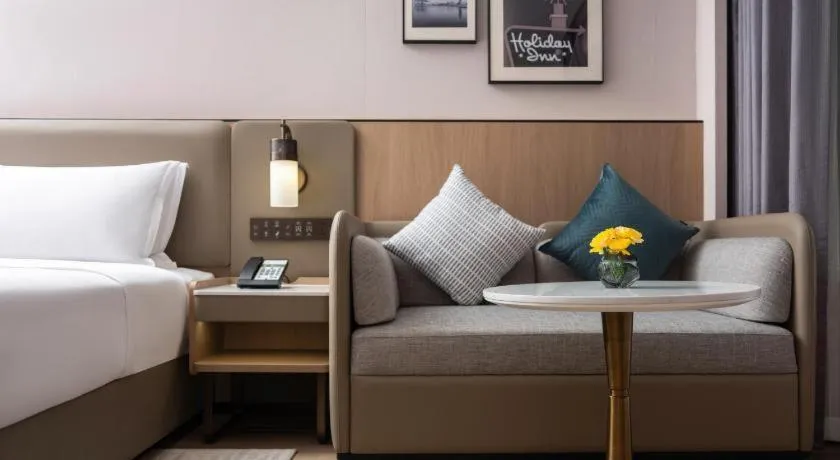 Bed in Yiwu Yimei Plaza Hotel