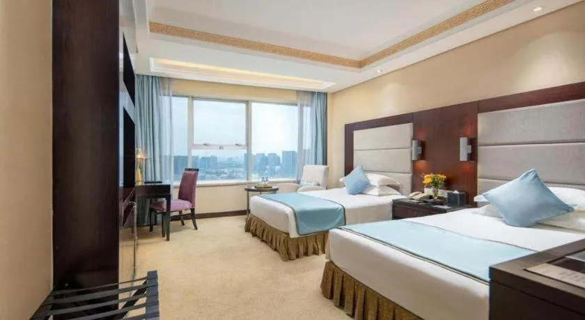 Bed in Yiwu Yimei Plaza Hotel