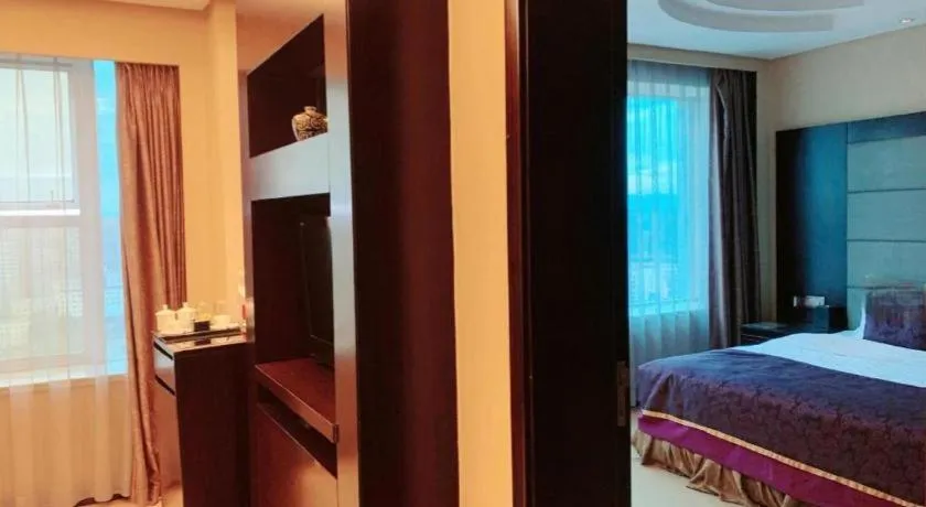 Bed in Yiwu Yimei Plaza Hotel