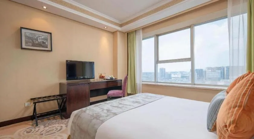 Bed in Yiwu Yimei Plaza Hotel