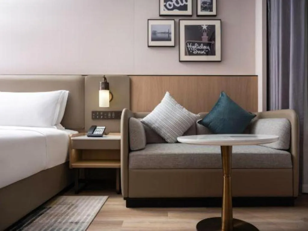 Bed in Yiwu Yimei Plaza Hotel