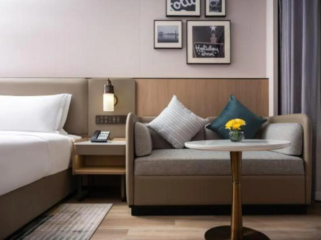 Bed in Yiwu Yimei Plaza Hotel