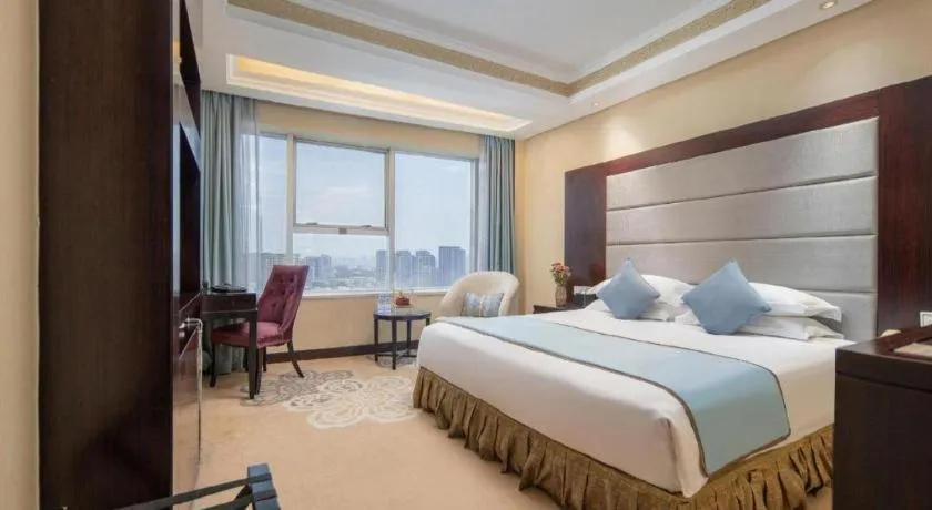 Bed in Yiwu Yimei Plaza Hotel