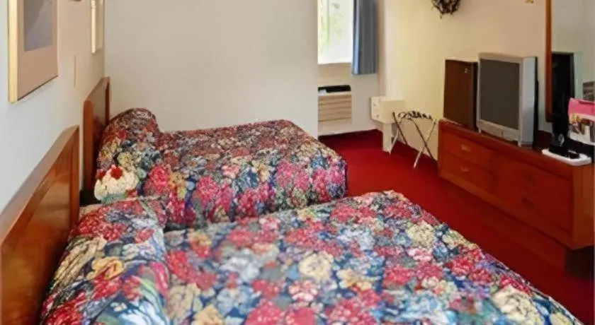 Bed in Baymont by Wyndham Lake George