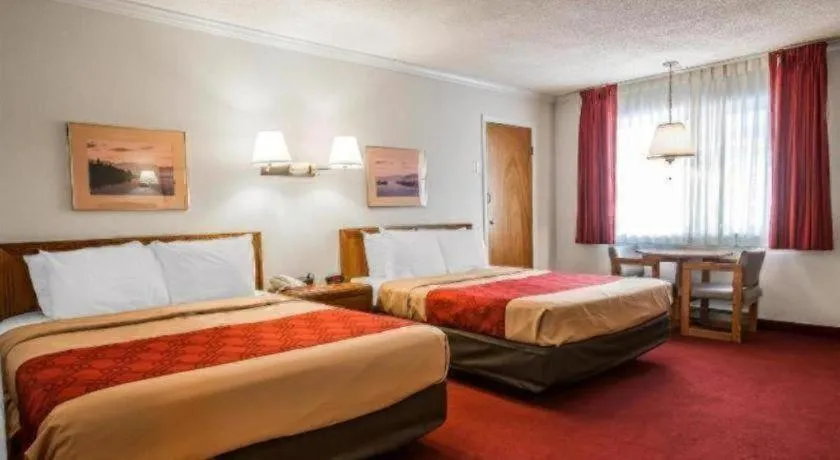 Bed in Baymont by Wyndham Lake George