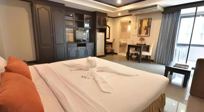 Bed in The Heritage Sathorn Suite Hotel