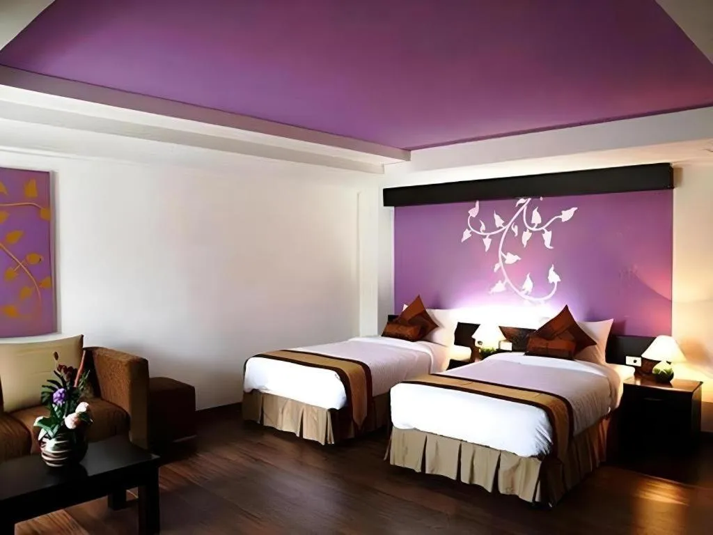 Bed in The Heritage Sathorn Suite Hotel