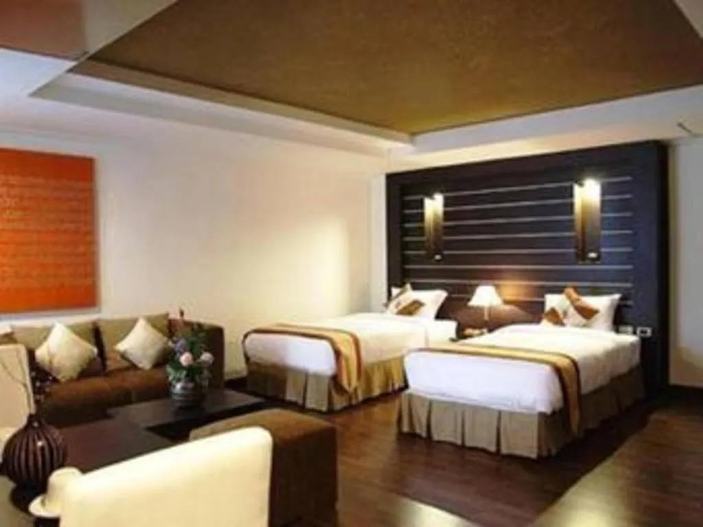 Bed in The Heritage Sathorn Suite Hotel