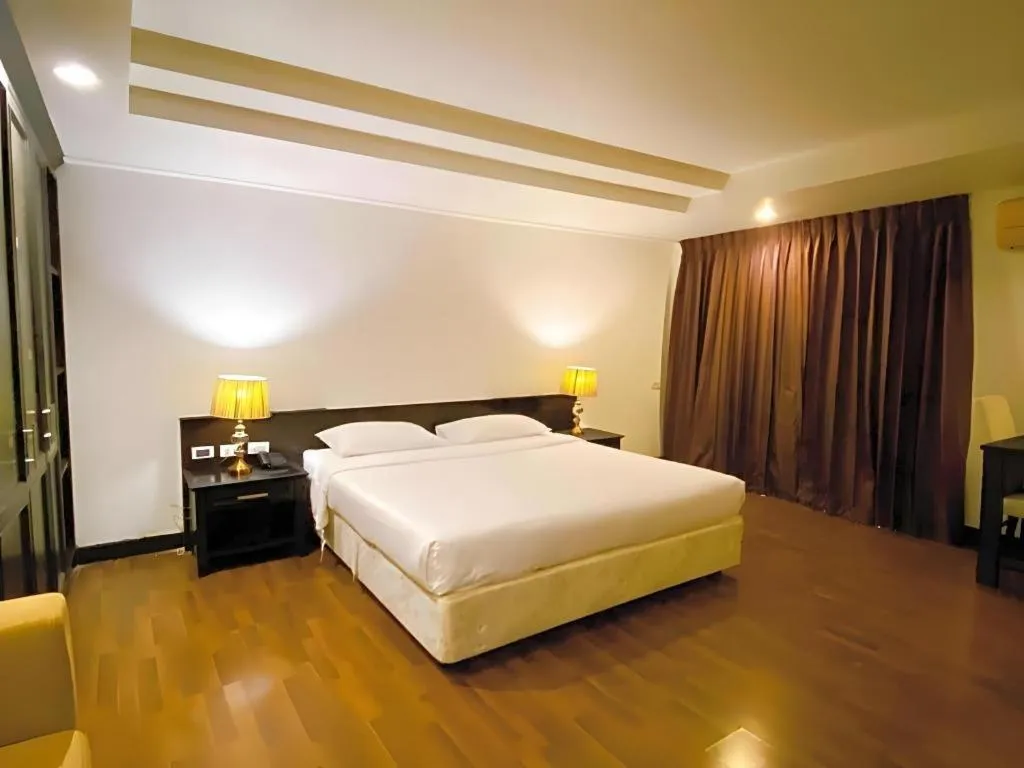 Bed in The Heritage Sathorn Suite Hotel