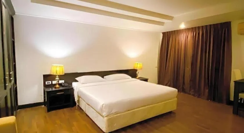 Bed in The Heritage Sathorn Suite Hotel