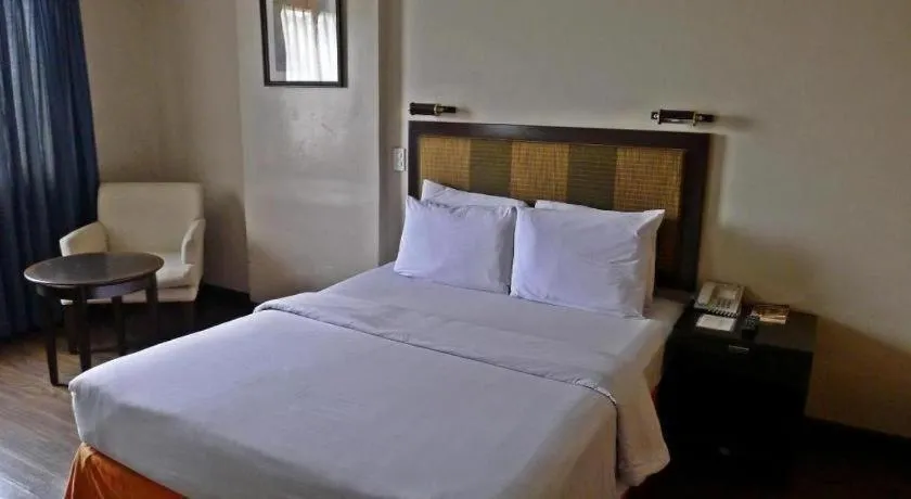 Bed in Baguio Burnham Suites Hotel