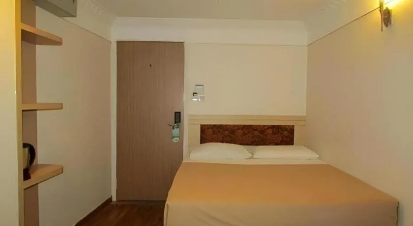 Bed in Arianna Hotel