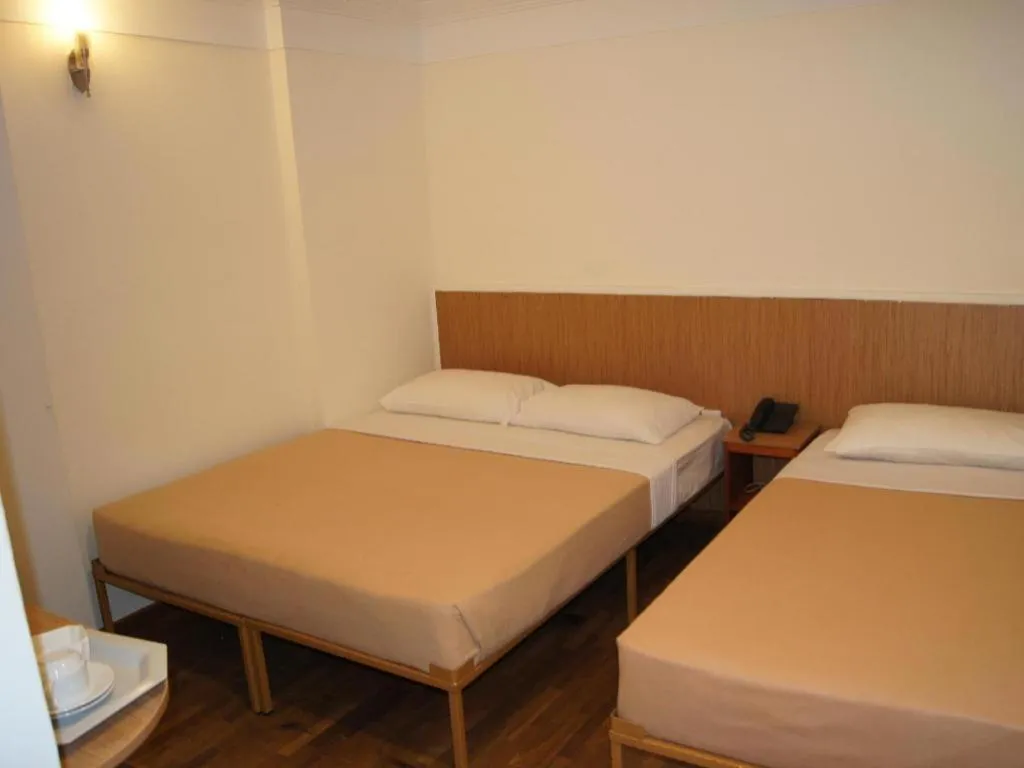 Bed in Arianna Hotel